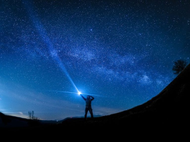 Freelancing Guide - silhouette of man holding flashlight