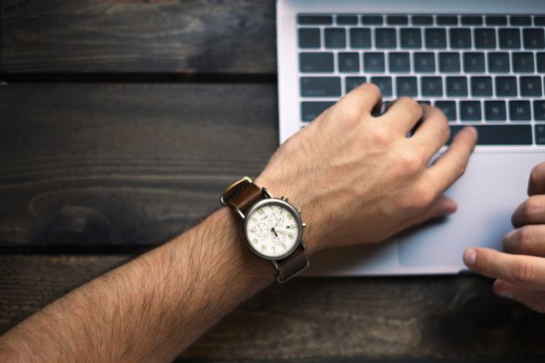 Time Management - person wearing brown and white watch