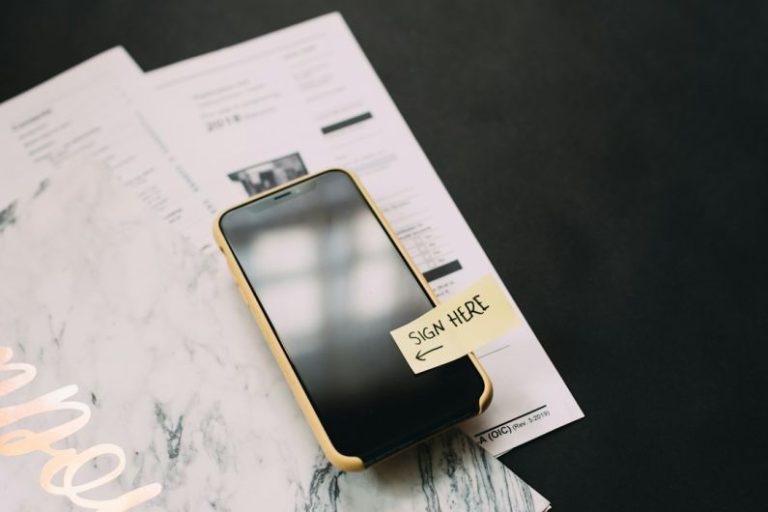 Contracts Freelancing - black smartphone
