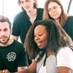 Marketing Freelancer - Woman Sharing Her Presentation with her Colleagues