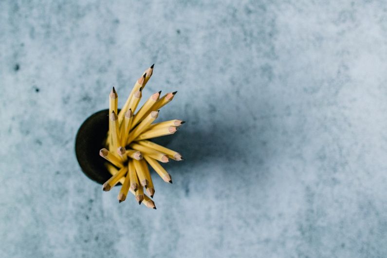 Continuous Learning - yellow flower on gray surface