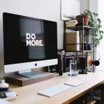 Personal Brand - silver iMac with keyboard and trackpad inside room