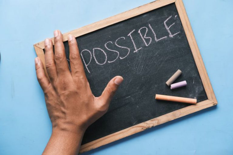 Challenge Innovation - a chalkboard with the word possible written on it