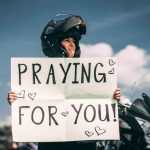 Supportive Community - man in black helmet riding motorcycle