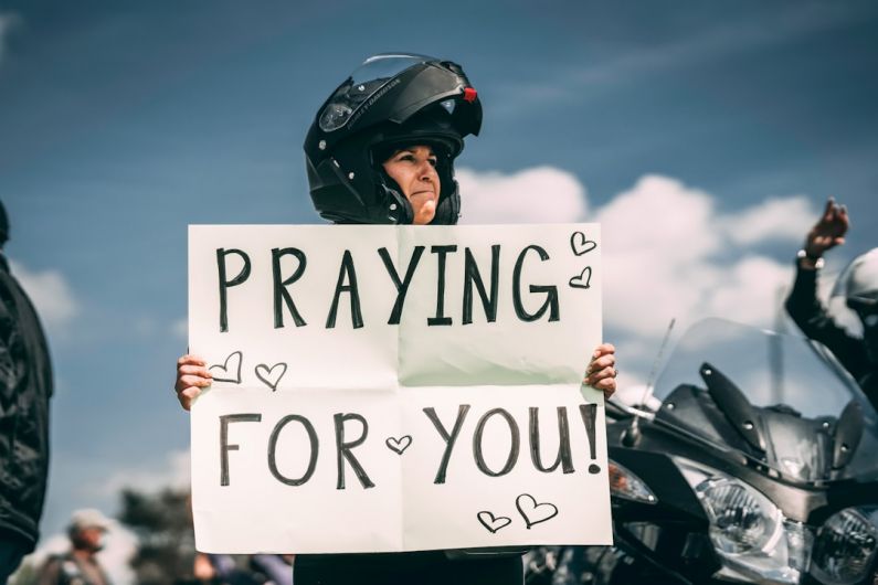 Supportive Community - man in black helmet riding motorcycle