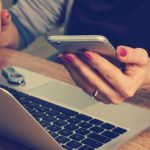 Technology Impact - woman holding silver iPhone 6