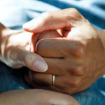 Self-care Importance - person wearing gold wedding band