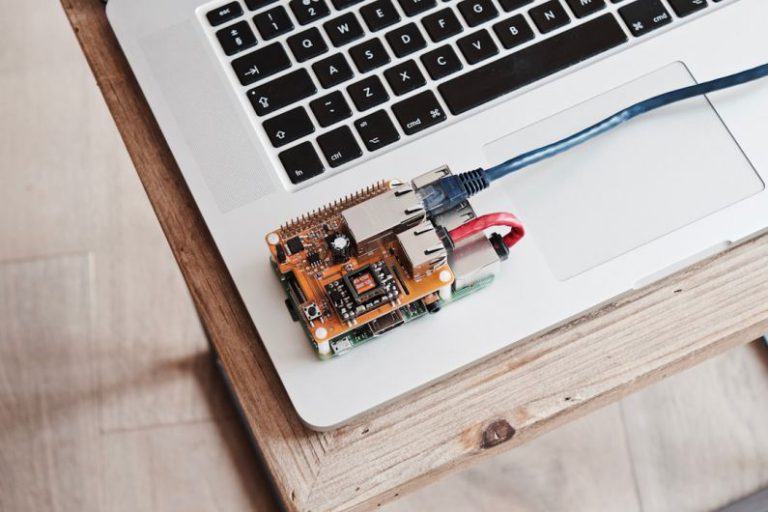 IoT Creative - brown circuit board on laptop