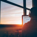 Future Work - man sitting facing monitor