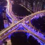 Smart Cities - aerial photography of bridge near buildings