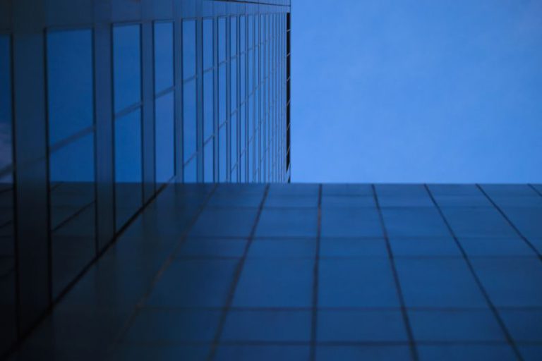 Innovative Design - a tall building with a blue sky in the background