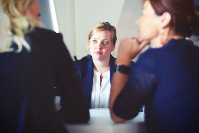 Career Transition - three women sitting beside table