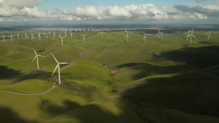 Green Technology - white windmill during daytime