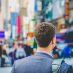 Career Transition - shallow focus photography of man in suit jacket's back