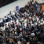 Informal Networking - crowd of people in building lobby