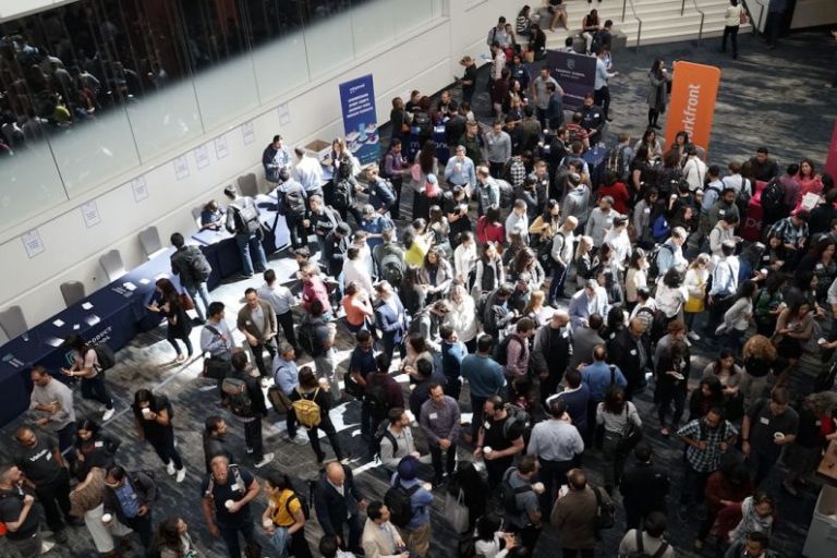 Informal Networking - crowd of people in building lobby