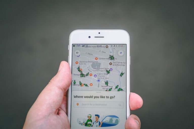 Gig Economy - person holding silver iPhone 6