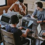 Collaboration Skills - group of people using laptop computer