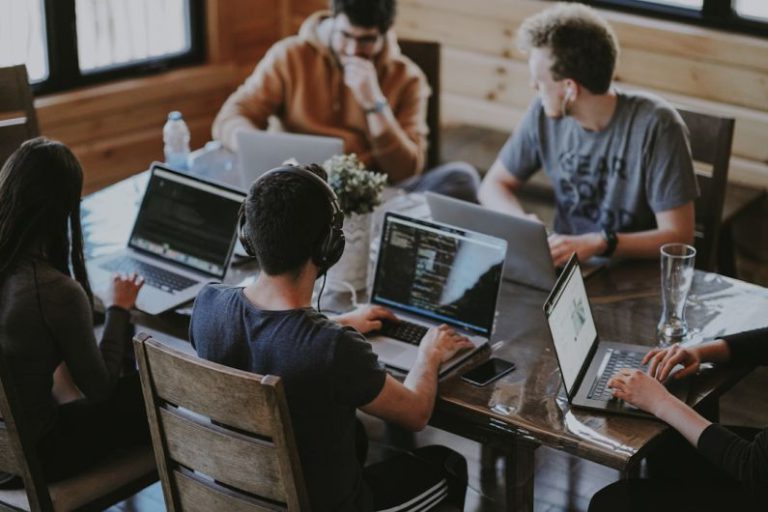 Collaboration Skills - group of people using laptop computer