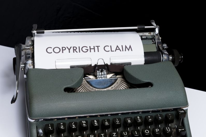 Intellectual Property - green and white braille typewriter